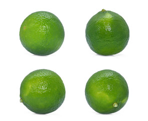 whole fresh green lime isolated on white background
