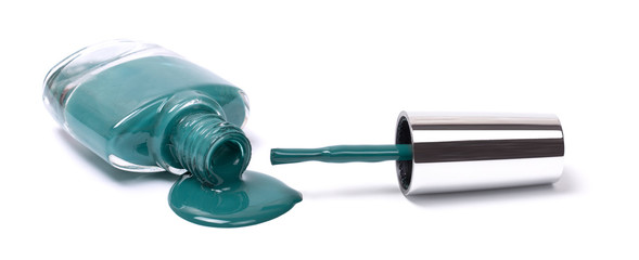 Glass bottles of dark green nail polish isolated on white background