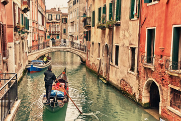 Fototapeta na wymiar Gondola on canal in Venice