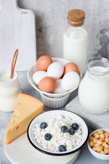 Fresh Organic Dairy Products On Concrete Background