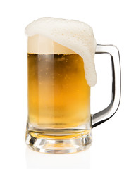 Mug of beer with froth foam on glass isolated on white background with clipping path object design