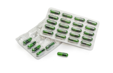 Two partially used blister packs with dietary supplements