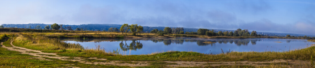 Lake early in the morning with a fog.