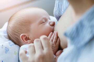 breastfeeding for newborns motherhood concept. helpful tips for feeding the baby. love and...