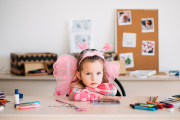 pensive unhappy child girl art space concept. mindset of little artist. bad mood moments.