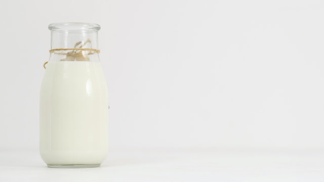 milk, kefir, greek yogurt bottle on white background. Fresh and fermented dairy products. Copy space concept