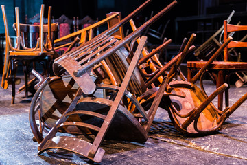 Old broken furniture. A pile of wooden wreckage of the chairs. Antiques.