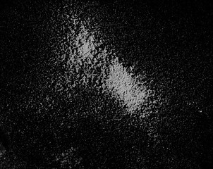 Washing powder, detergent isolated on black background, top view