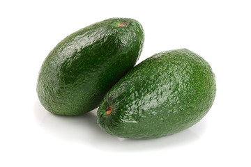 whole avocado isolated on white background close-up