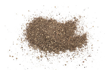 Ground black pepper isolated on white background. Top view