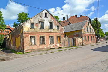 Fototapeta na wymiar Emergency houses of the German construction on Krasnoarmeyskaya Street. Gvardeysk, Kaliningrad region