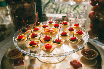 Sweet wedding buffet with different of desserts and fruits.