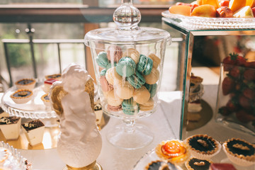 Sweet wedding buffet with different of desserts and fruits.