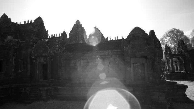 Dolly motion moving acrosss the interior of Banteay Srei in Angkor Wat Archeological Park.