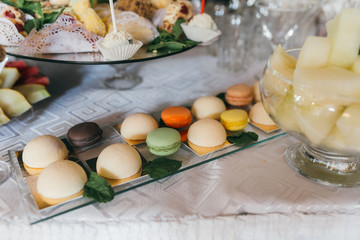 Sweet wedding buffet with different of desserts and fruits.
