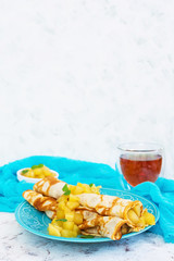 Pancakes with apples on white background