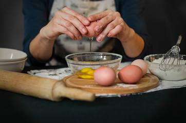 the chef breaks the eggs