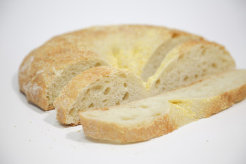 Sliced loaf of bread isolated on white