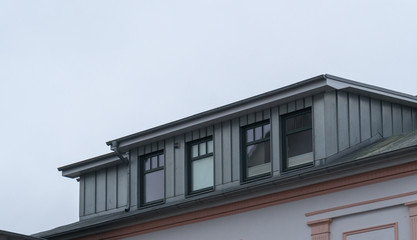 Fototapeta na wymiar Gaube aus Zinkblech mit Fenstern