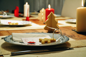 Festive decorated dinner table for Christmas or New Year celebration