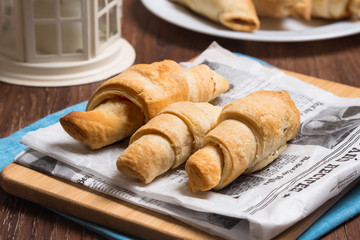 Croissants on the newspaper.