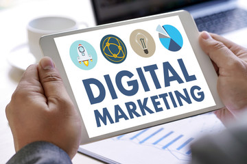 DIGITAL MARKETING new startup project MILLENNIALS Business team hands at work with financial reports and a laptop