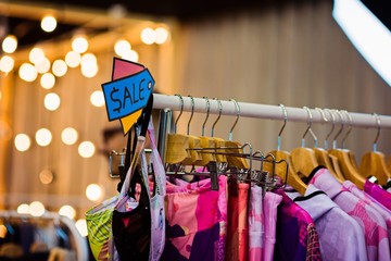 Boutique with clothes during sale