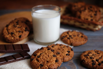 Chocolate cookies on wooden table. Chocolate chip cookies.