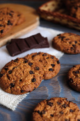 Chocolate cookies on wooden table. Chocolate chip cookies.