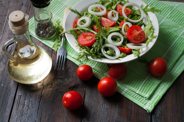 cherry tomatoes with arugula salad
