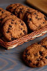 Chocolate cookies on wooden table. Chocolate chip cookies.