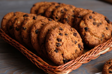 Chocolate cookies on wooden table. Chocolate chip cookies.