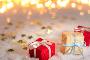 small Christmas presents composition on snow