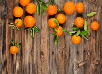 Fototapeta na wymiar Tangerine with leaves.