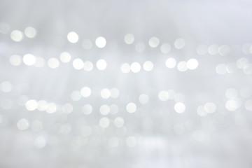 Abstract background soft white fabric clean for the wedding or Christmas with light bokeh gently