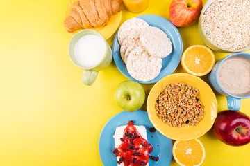 Poster Healthy Breakfast. Various Assortment Set. Orange Juice, Granola, Croissant, Coffee and Fruit. © bondarillia