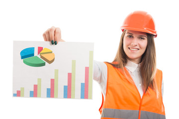 Beautiful architect engineer woman showing paper chart