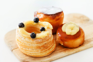 french pastries on the wood board