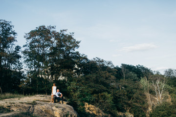 Amazing young couple in the forest