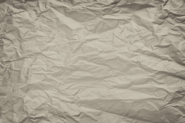 Brown crumpled paper background and texture, Wrinkled creased paper brown abstract