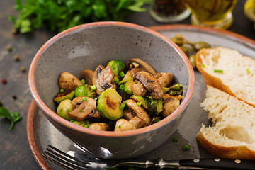 Vegan dish. Baked mushrooms with Brussels sprouts and herbs. Proper nutrition. Healthy lifestyle