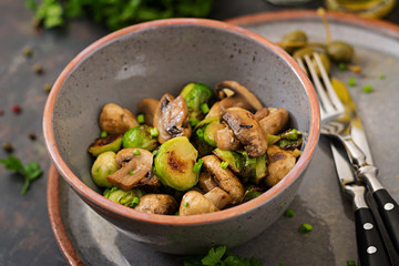 Vegan dish. Baked mushrooms with Brussels sprouts and herbs. Proper nutrition. Healthy lifestyle