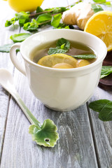 Freshly brewed ginger tea with mint