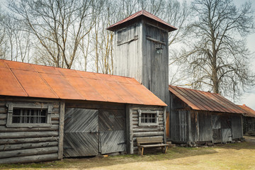 Weathered wooden barns in Russian village