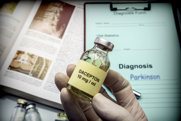 Doctor hold vial of dacepton in a hospital. Conceptual image - obrazy, fototapety, plakaty