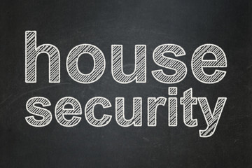 Security concept: text House Security on Black chalkboard background