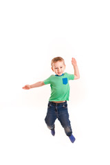 Active happy little boy jumping