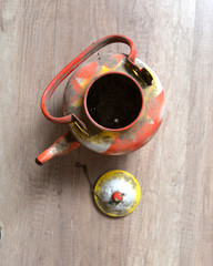 colorful vintage dirty and dusty teapot
