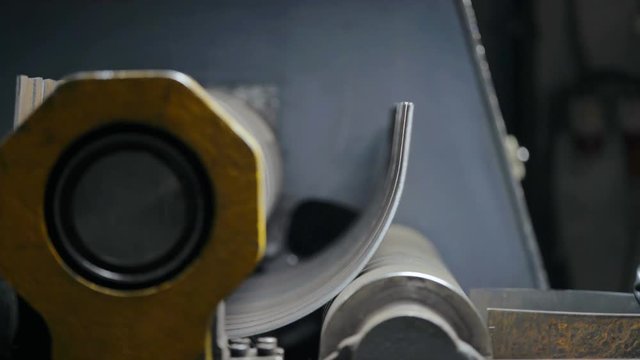 Modern equipment for bending metal plate on metalworking factory