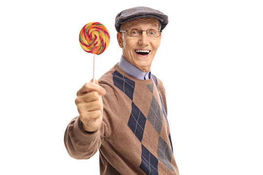 Cheerful senior with a lollipop